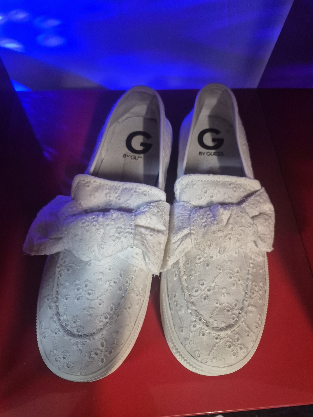 G by GUESS White Eyelet Bow Slip-On Shoes for Women